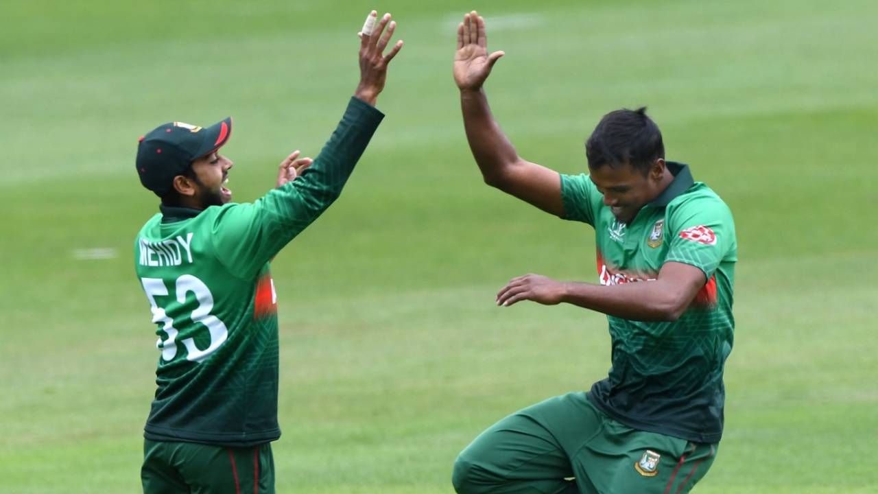 Rubel Hossain celebrates a wicket with Mehidy Hasan