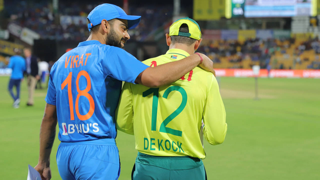 Virat Kohli and Quinton de Kock have a chat on their way to the coin toss, India v South Africa, 3rd T20I, Bengaluru, September 22, 2019