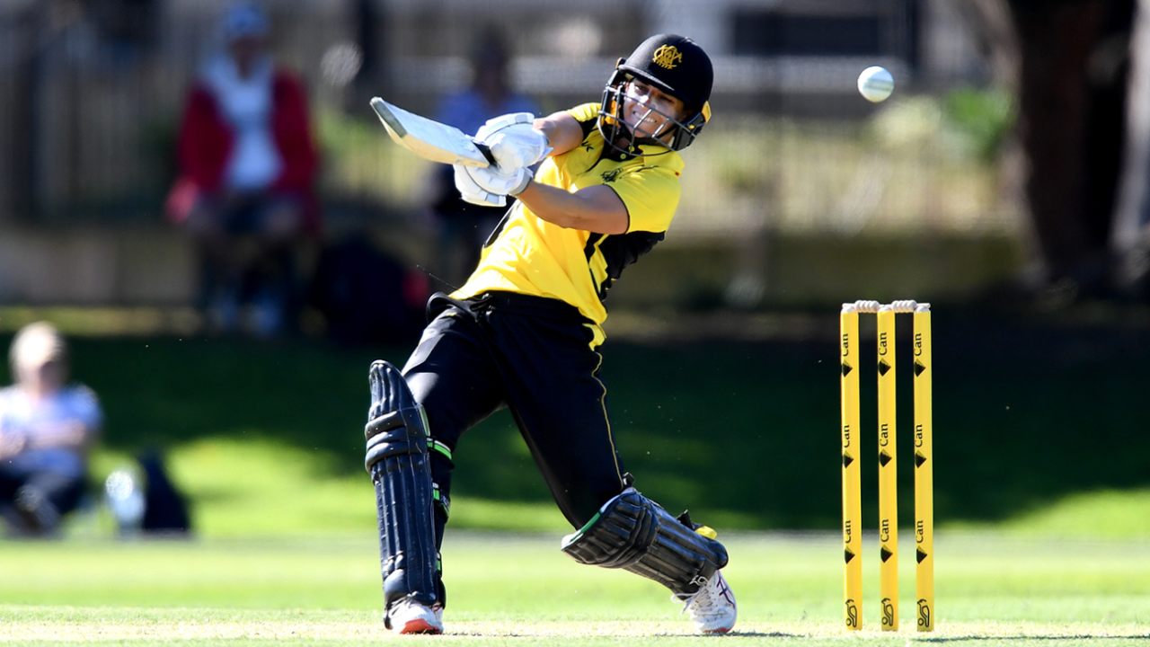 Nicole Bolton lofts over the off side during her half-century against Queensland&nbsp;&nbsp;&bull;&nbsp;&nbsp;Getty Images