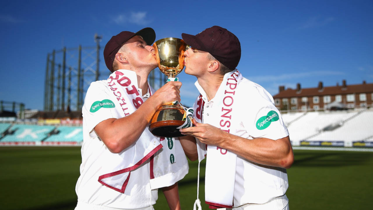 Sam and Tom Curran of Surrey kiss the Specsavers County Championship Division One Cup, Day Four, Surrey v Essex, at The Oval, in London, England, September 27, 2018