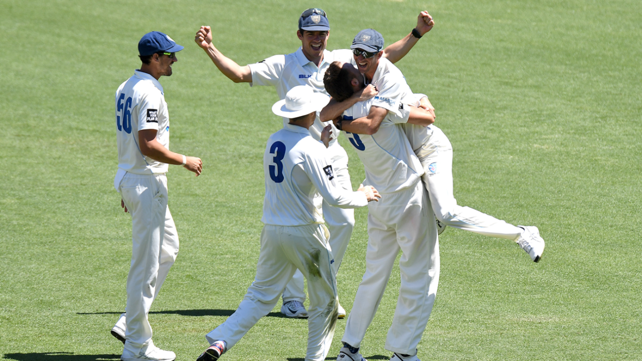 New South Wales team-mates celebrate with Harry Conway, Queensland v New South Wales, Sheffield Shield, Brisbane, October 13, 2019