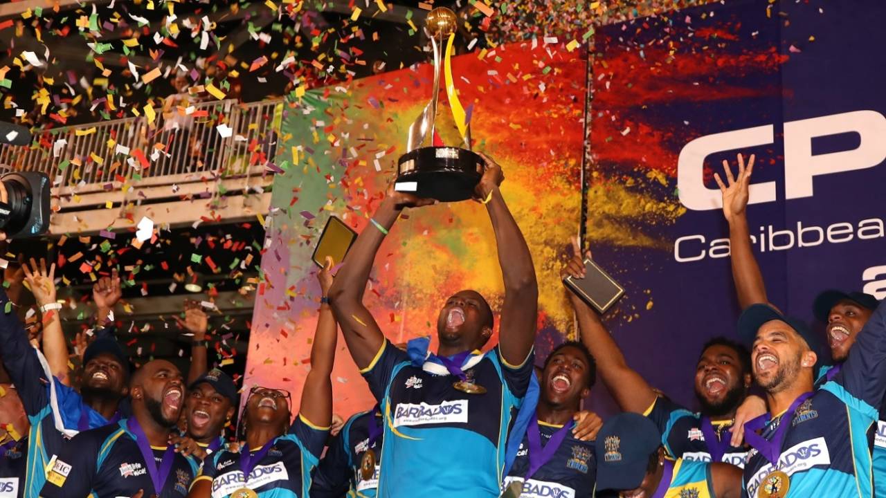 The Barbados Tridents players celebrate with the CPL trophy, Guyana Amazon Warriors v Barbados Tridents, CPL 2019 final, Trinidad, October 12, 2019