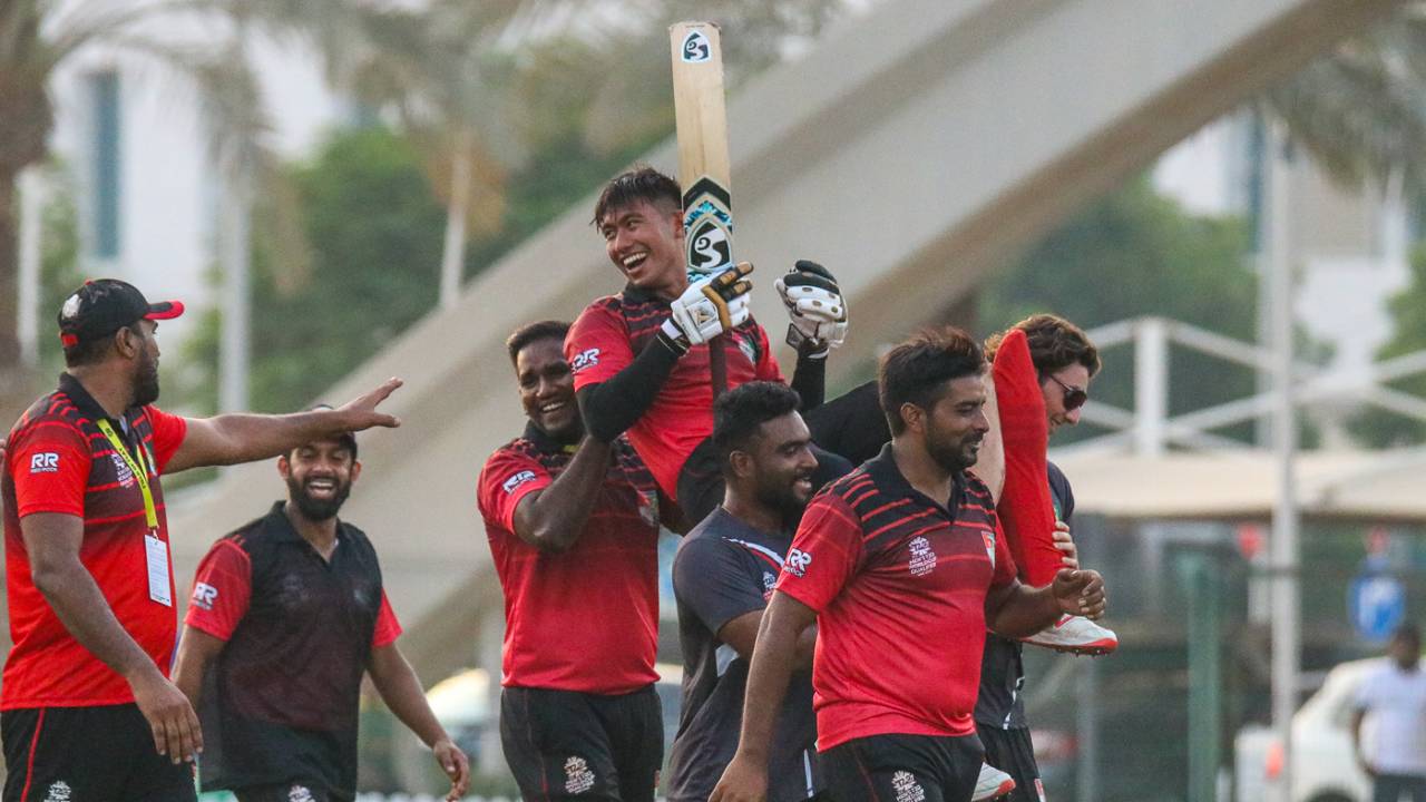 Navin Param is carried off the field after his unbeaten 72 off 41 balls took Singapore home, Bermuda v Singapore, ICC Men's T20 World Cup Qualifier, Dubai, October 20, 2019 