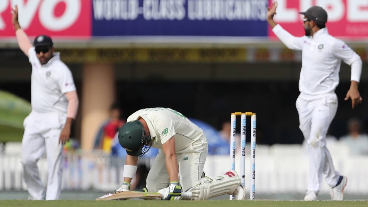 Dean Elgar reacts after being struck on his helmet by Umesh Yadav, India v South Africa, 3rd Test, Ranchi, 3rd day, October 21, 2019