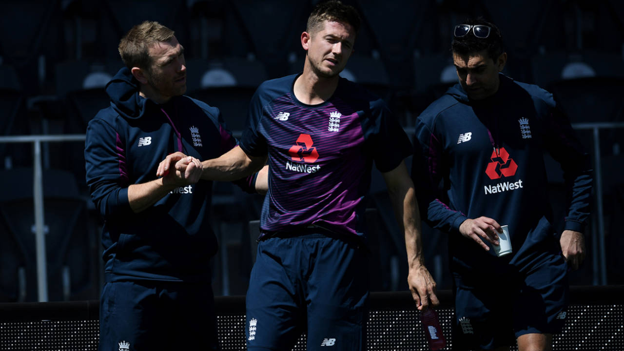 Joe Denly is helped away after suffering an injury in training, Christchurch, October 31, 2019