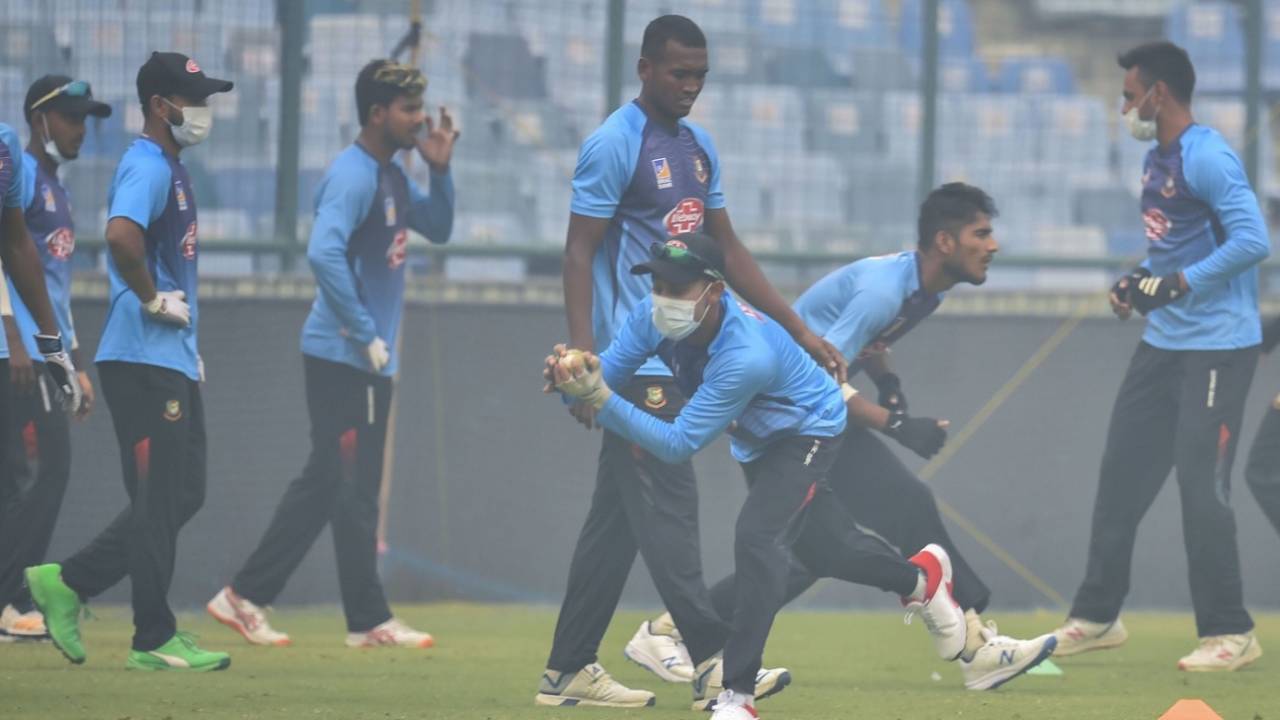 The Bangladesh players train in the mid-morning haze in Delhi