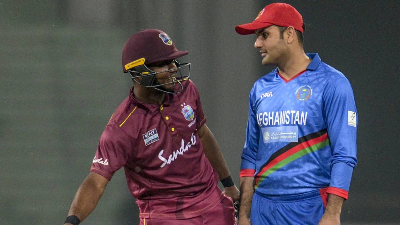 Evin Lewis and Mohammad Nabi have a chat, Afghanistan v West Indies, 1st T20I, Lucknow, November 14, 2019