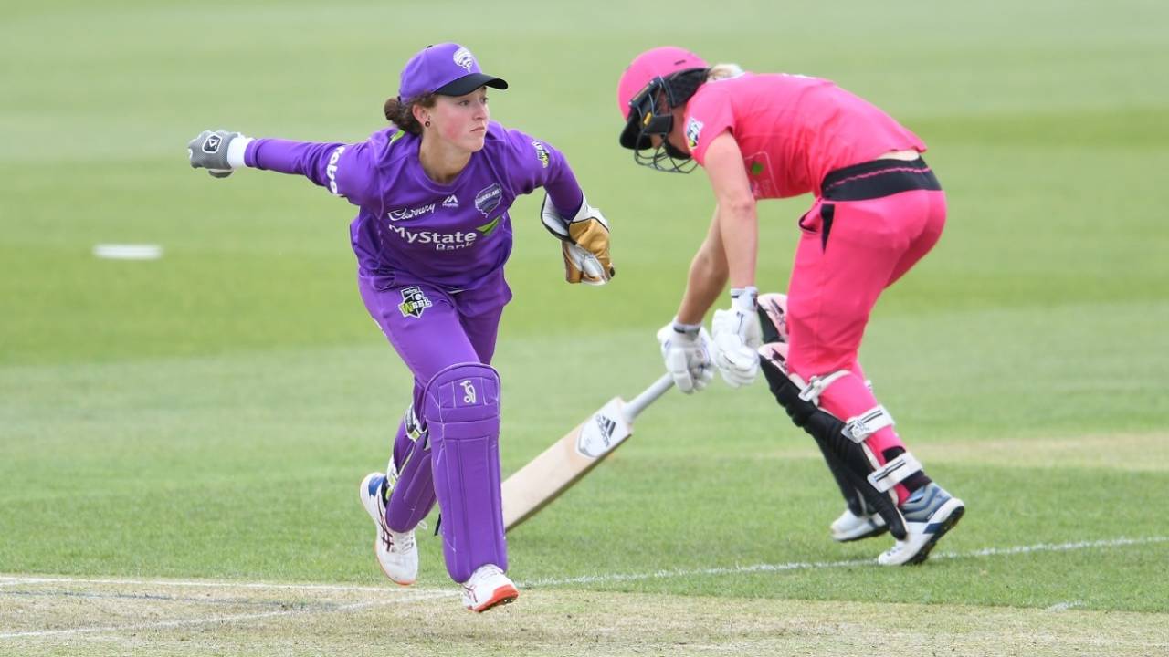 Wicketkeeper Emily Smith in action