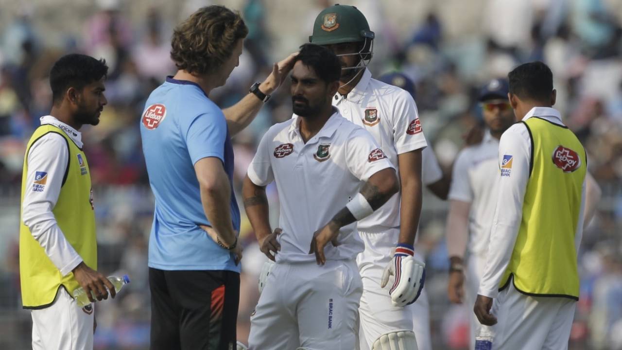 Bangladesh's team physio checks in on Liton Das after he was hit on the helmet&nbsp;&nbsp;&bull;&nbsp;&nbsp;Associated Press