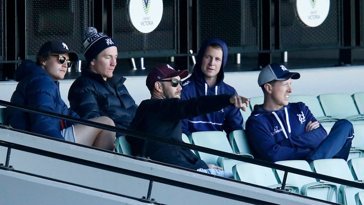 Glenn Maxwell and Will Pucovski watch a match with their Victoria team-mates&nbsp;&nbsp;&bull;&nbsp;&nbsp;Getty Images