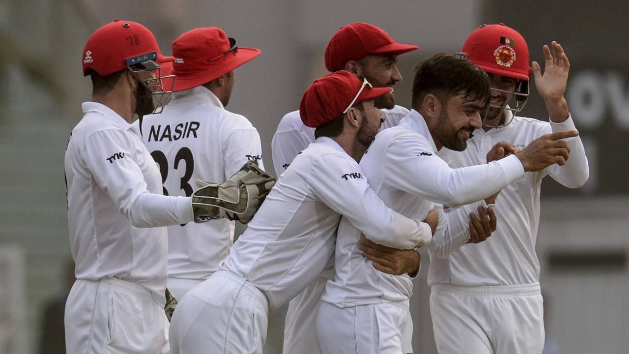 Rashid Khan is elated after picking up a wicket&nbsp;&nbsp;&bull;&nbsp;&nbsp;AFP
