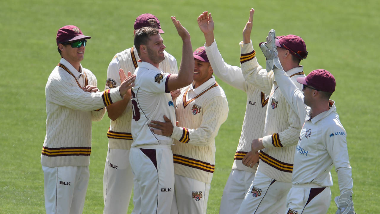 Mark Steketee celebrates a wicket with his teammates, Tasmania v Queensland, Sheffield Shield, Hobart, November 29, 2019