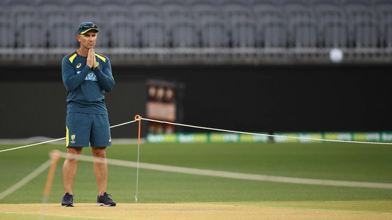 Justin Langer inspects the pitch at Perth Stadium, Perth, December 10, 2019