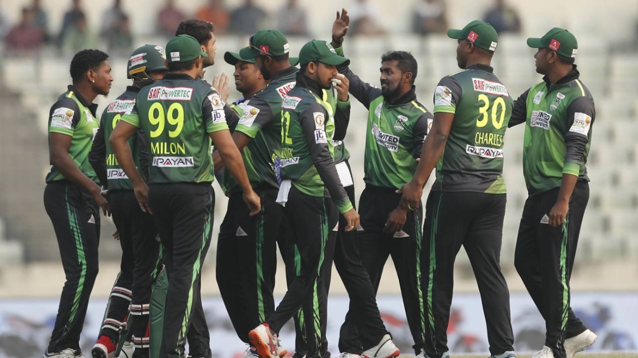 Krishmar Santokie (extreme left) celebrates a wicket with his Sylhet team-mates