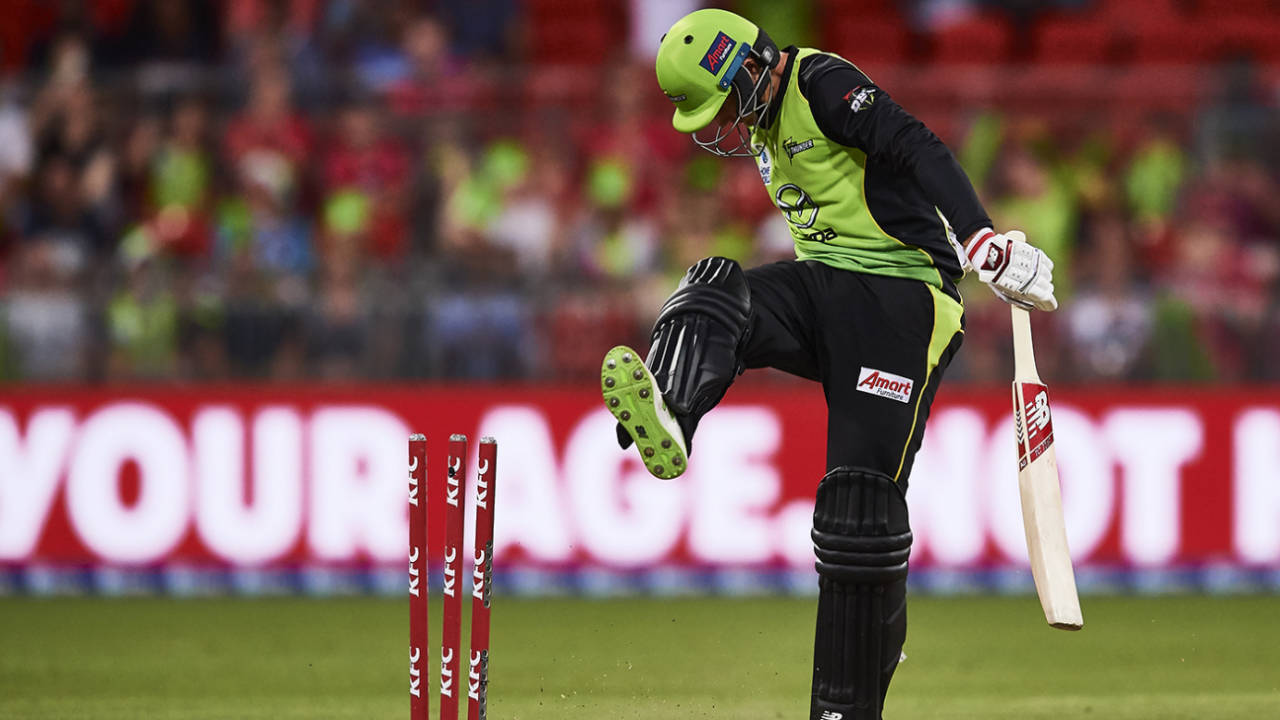 Joe Root kicks out in frustration after a low score for Sydney Thunder