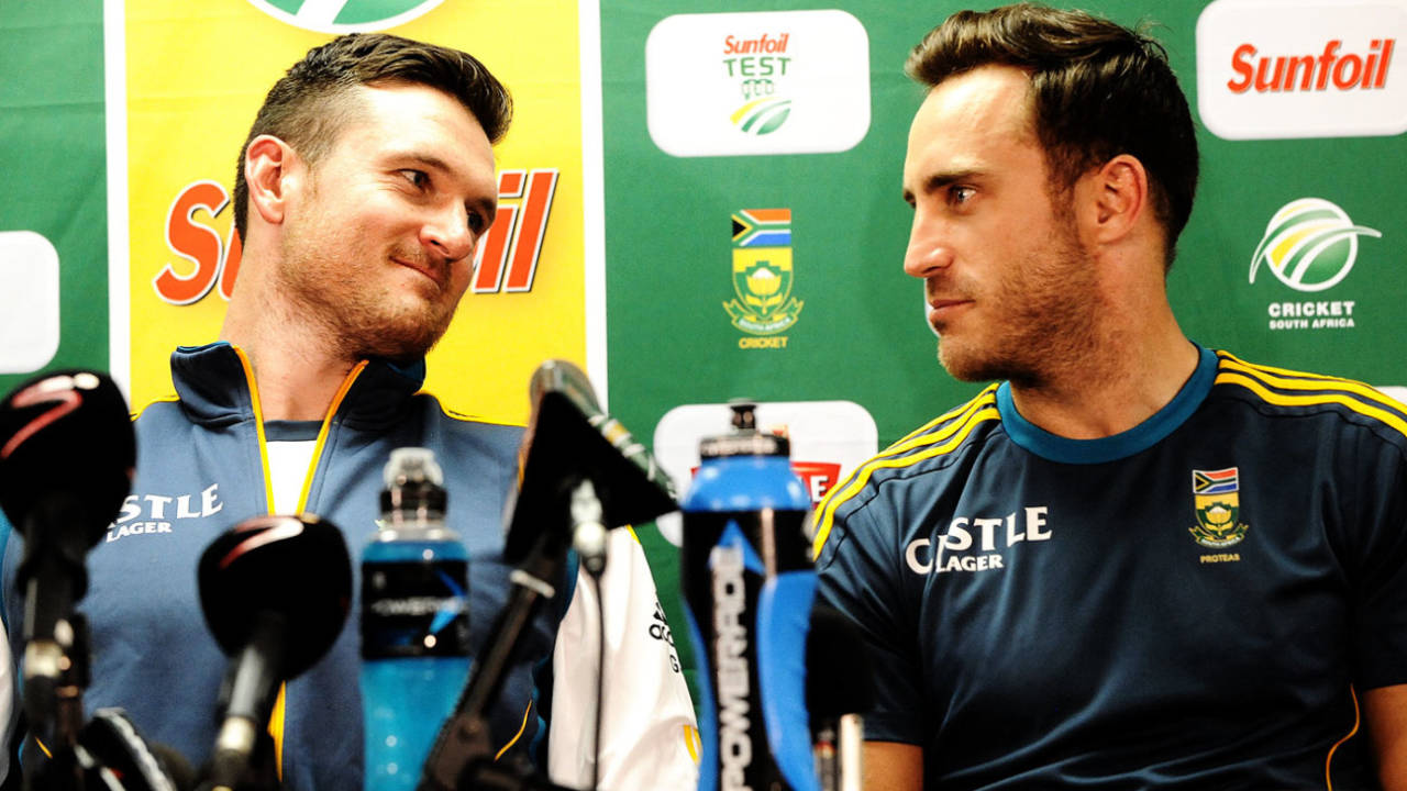Graeme Smith and Faf du Plessis talk to each other at a press conference&nbsp;&nbsp;&bull;&nbsp;&nbsp;Getty Images