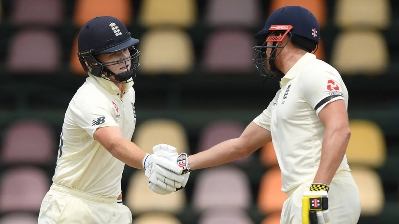 Ollie Pope is congratulated by Jonny Bairstow after reaching his century, South Africa A v England, three-day practice match, Benoni, December 20, 2019