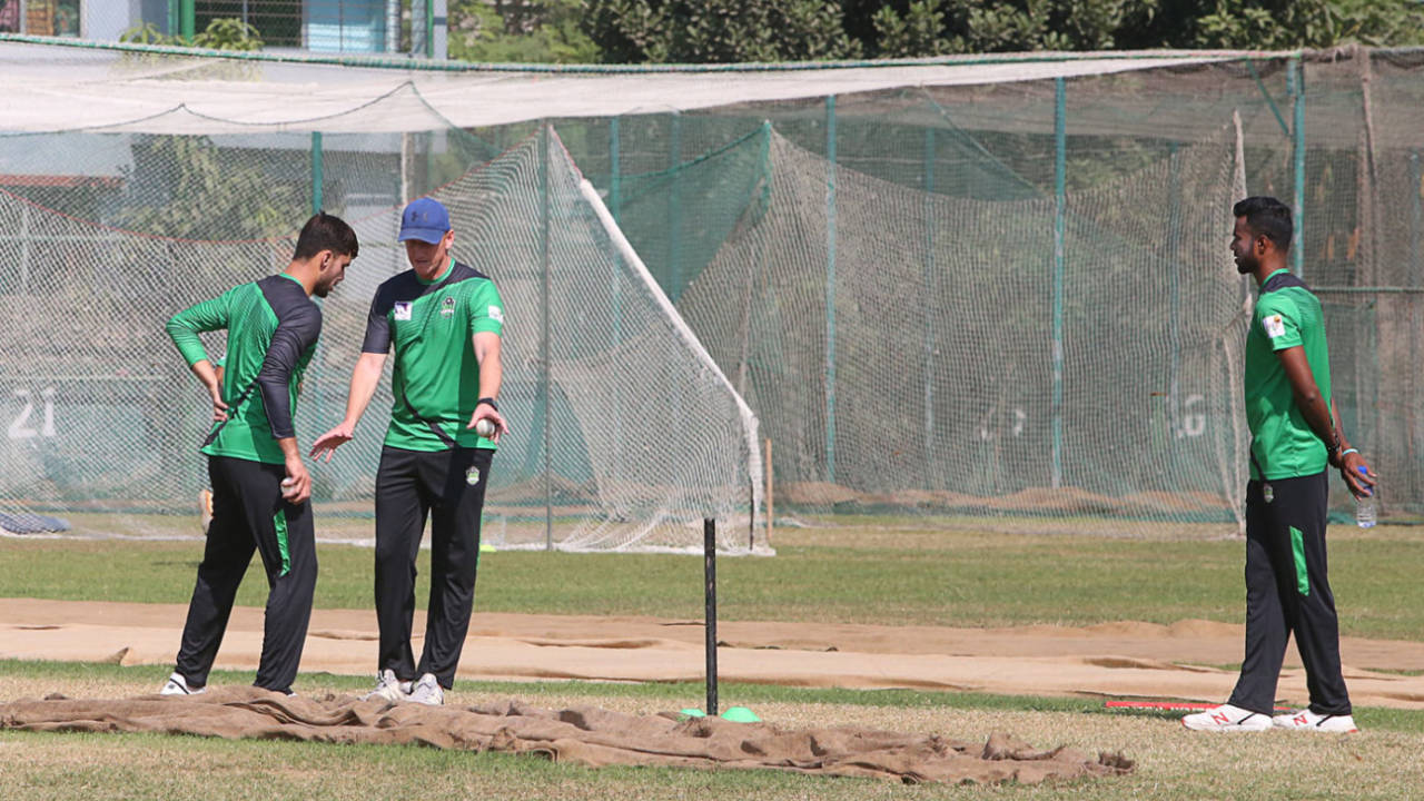 Nantie Hayward works with a bowler in the nets
