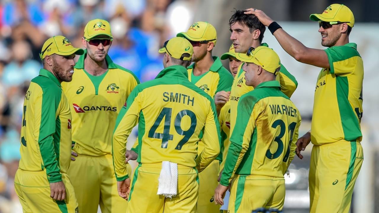 Pat Cummins is congratulated by Mitchell Starc for a wicket, India v Australia, 1st ODI, Mumbai, January 14, 2020
