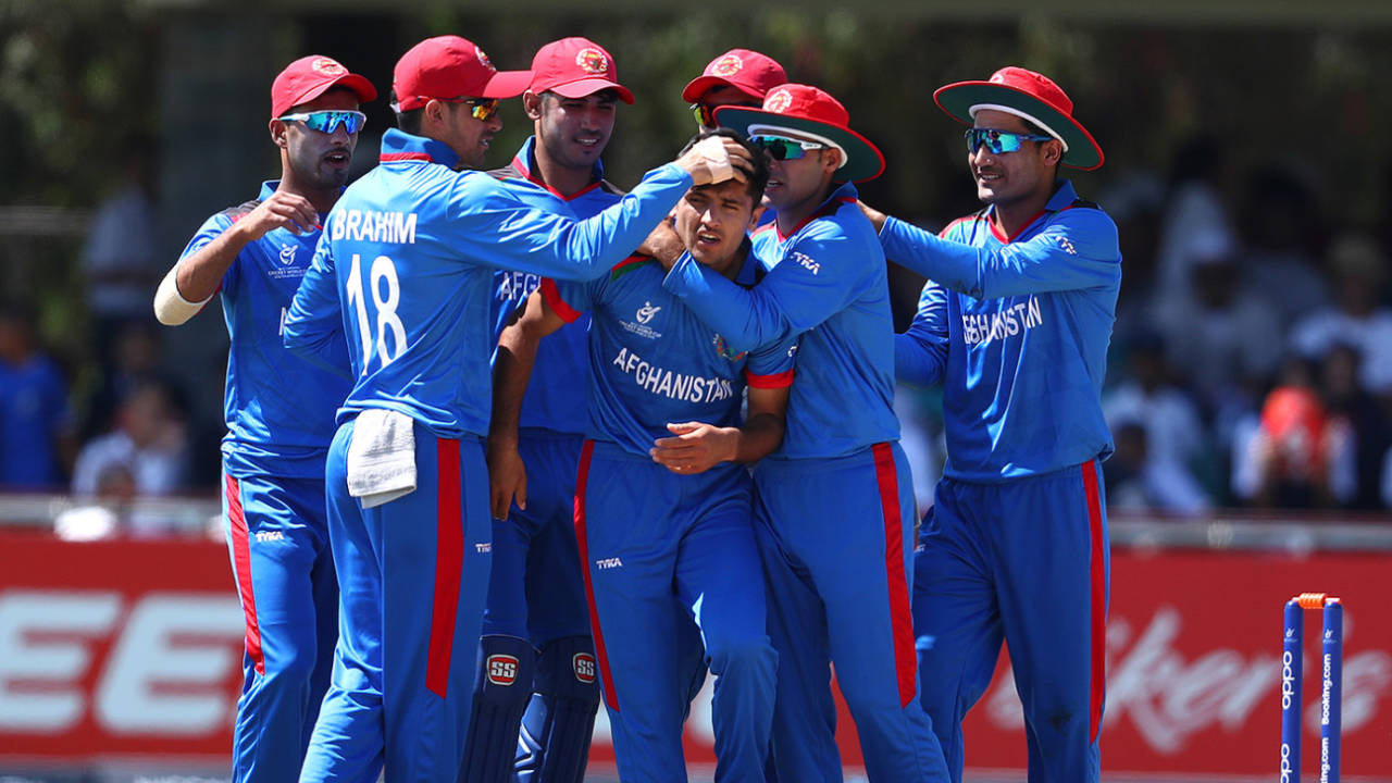 Fazal Haque is congratulated by his team-mates, South Africa v Afghanistan, U-19 World Cup, Kimberley, January 17, 2020