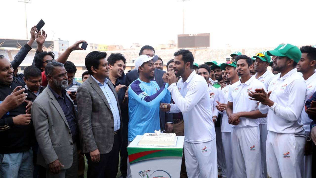 Raqibul Hasan, Bangladesh's only other first-class triple centurion, feeds Tamim Iqbal a piece of cake