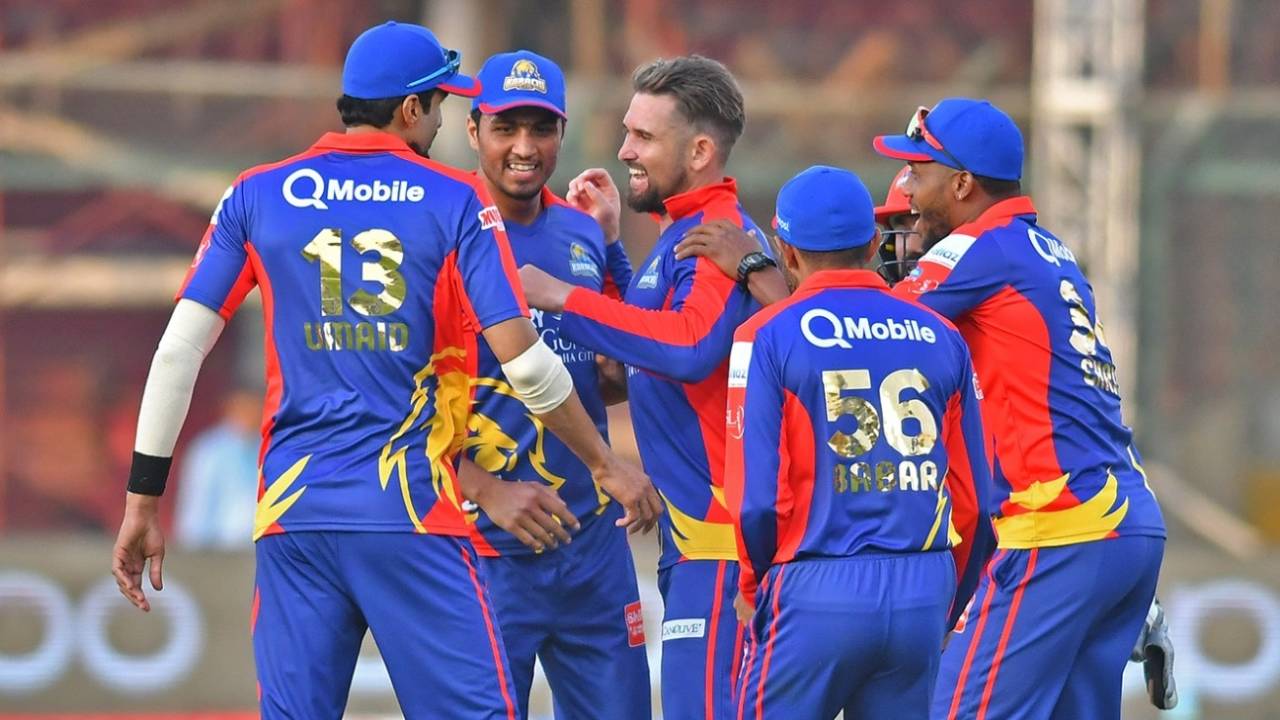 The Karachi Kings players celebrate a wicket