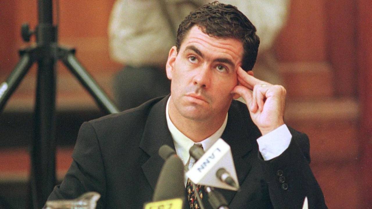 Hansie Cronje ponders a point during his cross-examination at the King Commission Inquiry into allegations of cricket match-fixing, Cape Town, June 22, 2000.