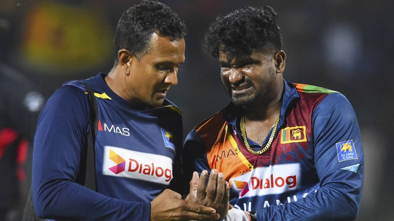 Kusal Perera had to go off the field after hurting a finger&nbsp;&nbsp;&bull;&nbsp;&nbsp;AFP via Getty Images