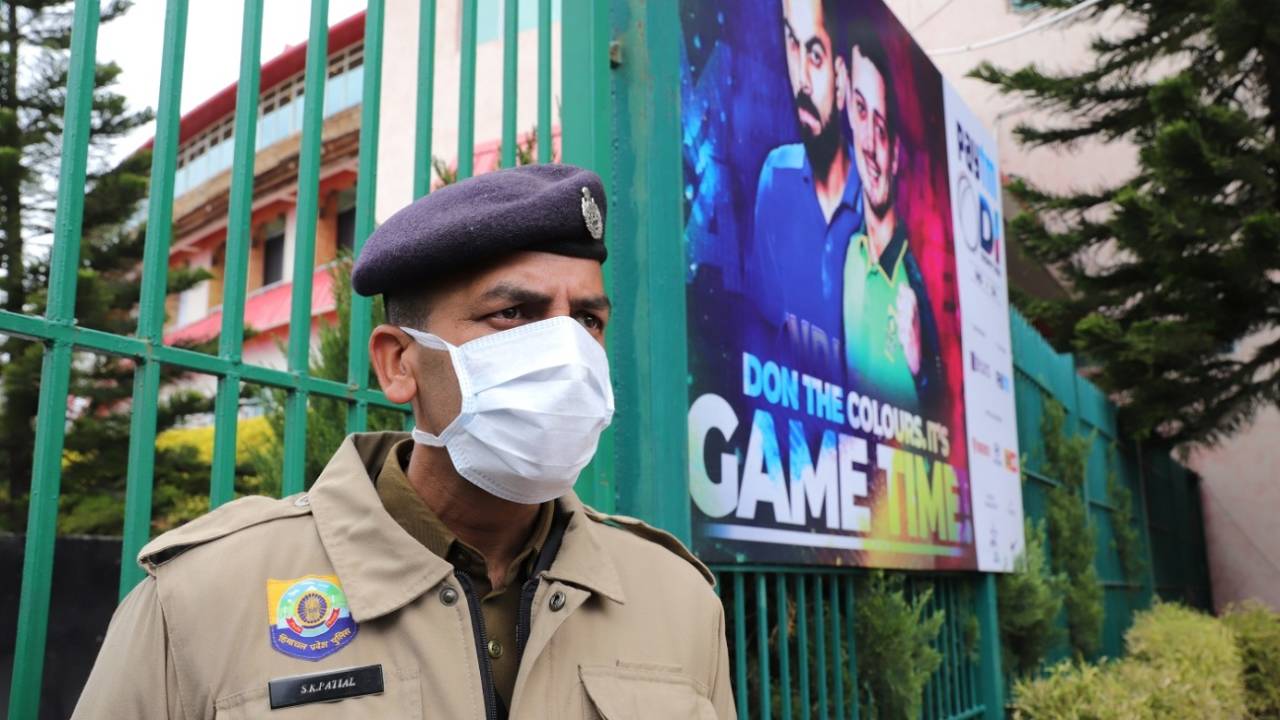 A policeman wears a mask while on security detail amid the corona virus pandemic, India v South Africa, 1st ODI, Dharamsala, March 12, 2020