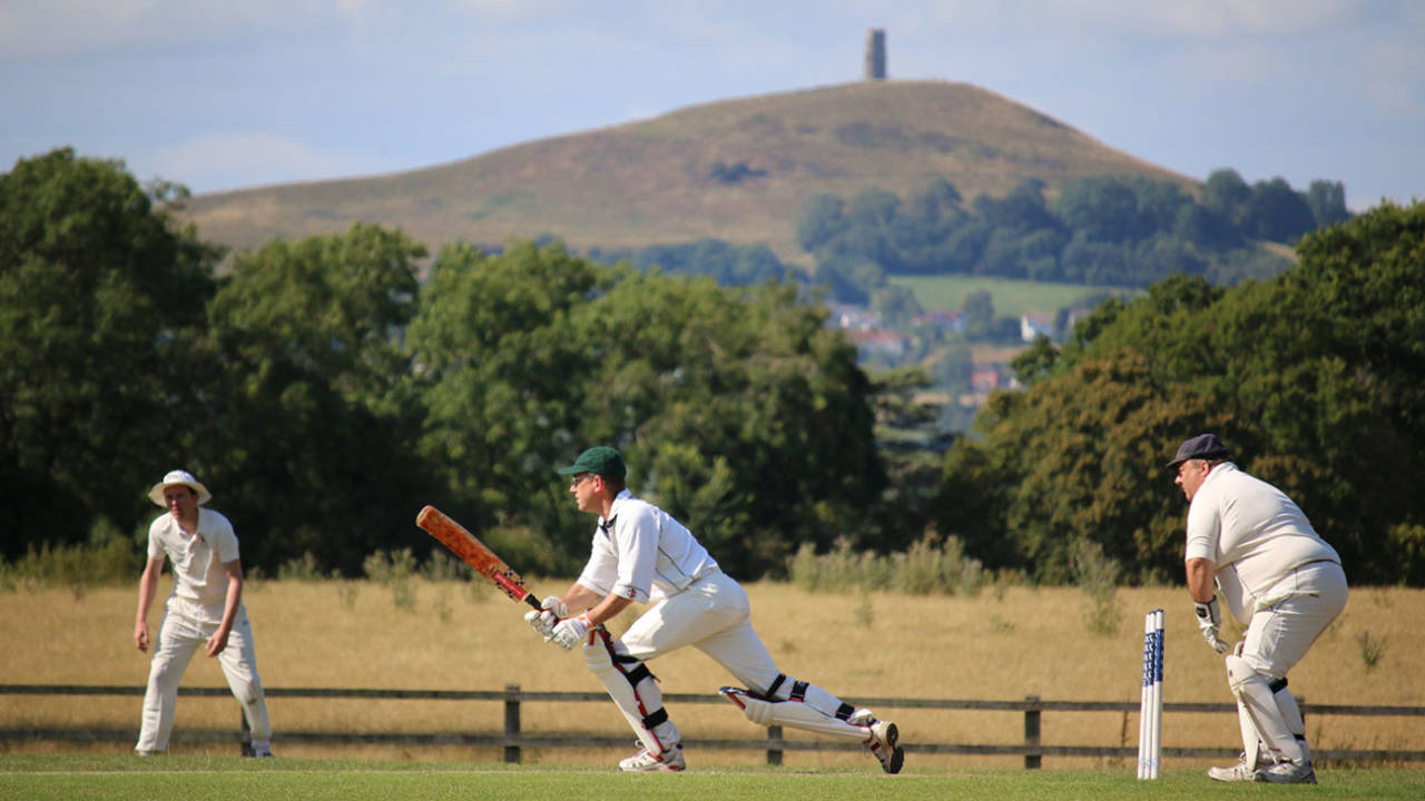 A batsman plays a shot in the shadow of Glastonbury Tor&nbsp;&nbsp;&bull;&nbsp;&nbsp;Andrew Miller