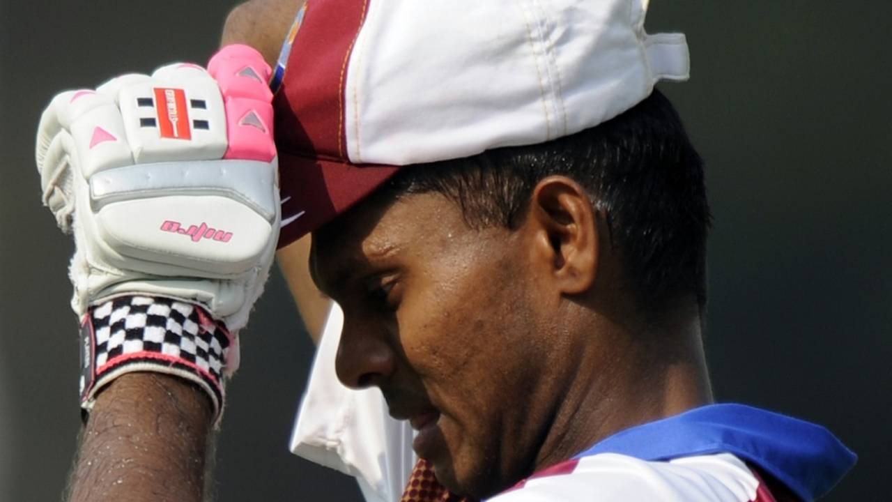 Shivnarine Chanderpaul pulls on his cap before a batting session