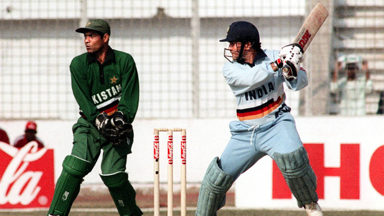 Wicketkeeper Rashid Latif watches Sachin Tendulkar cut his way to 95, India v Pakistan, Independence Cup, 1st ODI, January 14, 1998