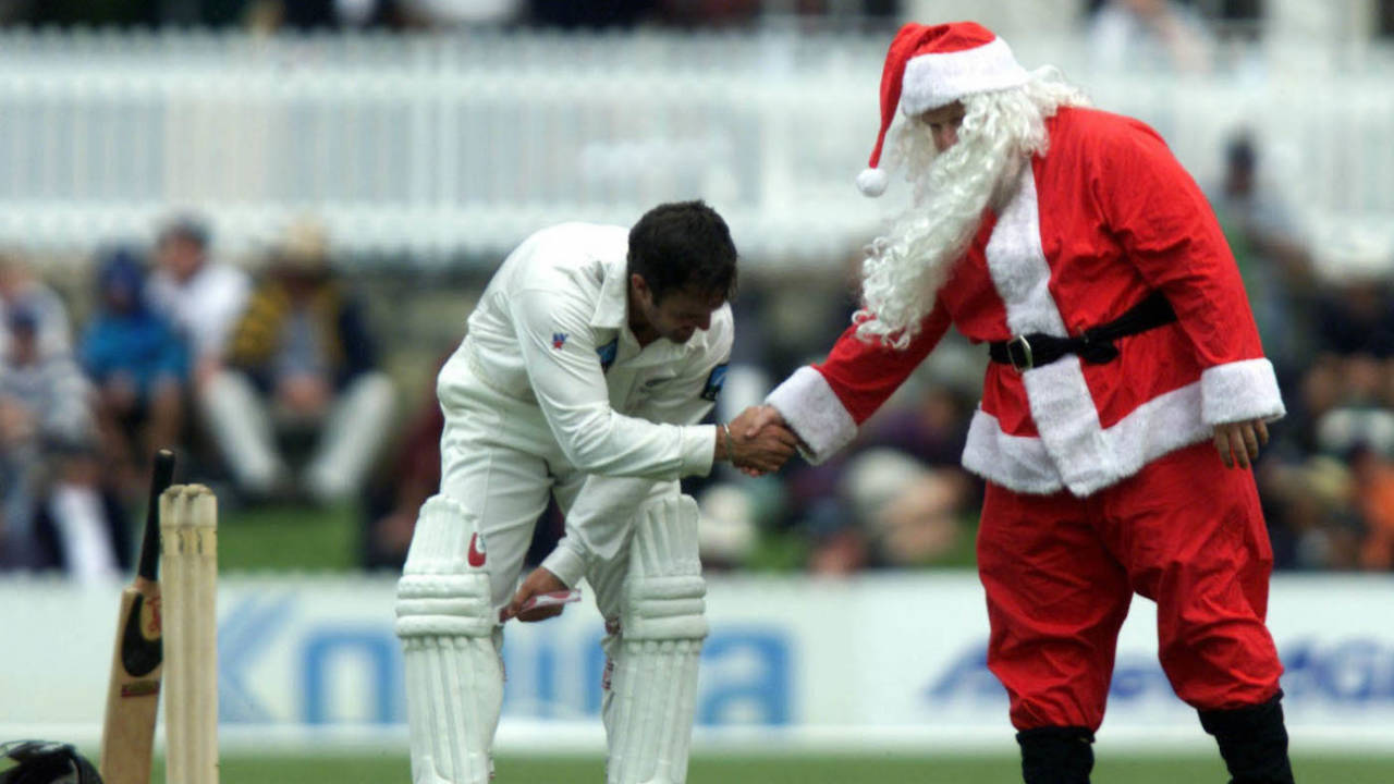 Nathan Astle gets a visit from Santa, Tour Match, Prime Minister's XI v New Zealanders, Canberra, Oct 23 2015
