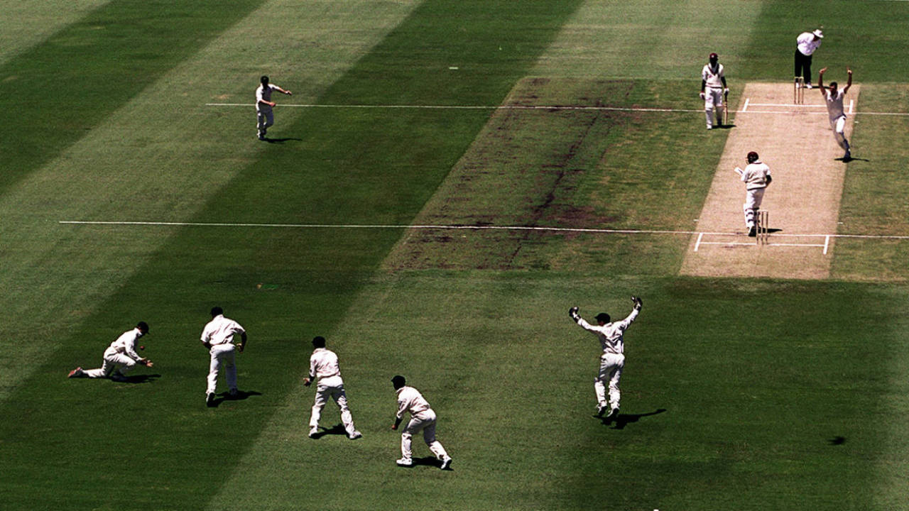Stuart MacGill takes a catch at fourth slip to dismiss Brian Lara and give Glenn McGrath a hat-trick and his 300th Test victim, Australia v West Indies, 2nd Test, Perth, 1st Test, December 1, 2000