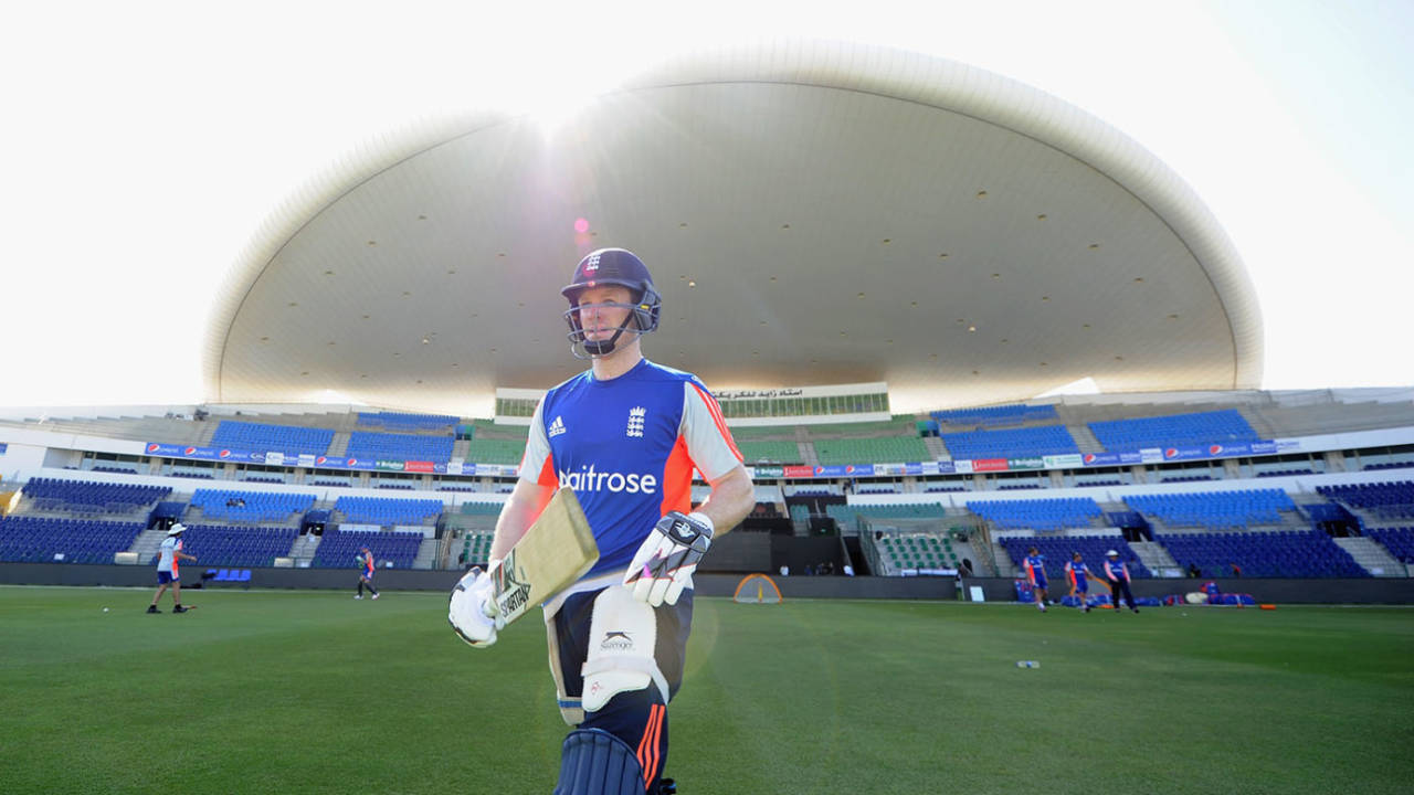 Eoin Morgan walks out for a net at Zayed Cricket Stadium, Abu Dhabi
