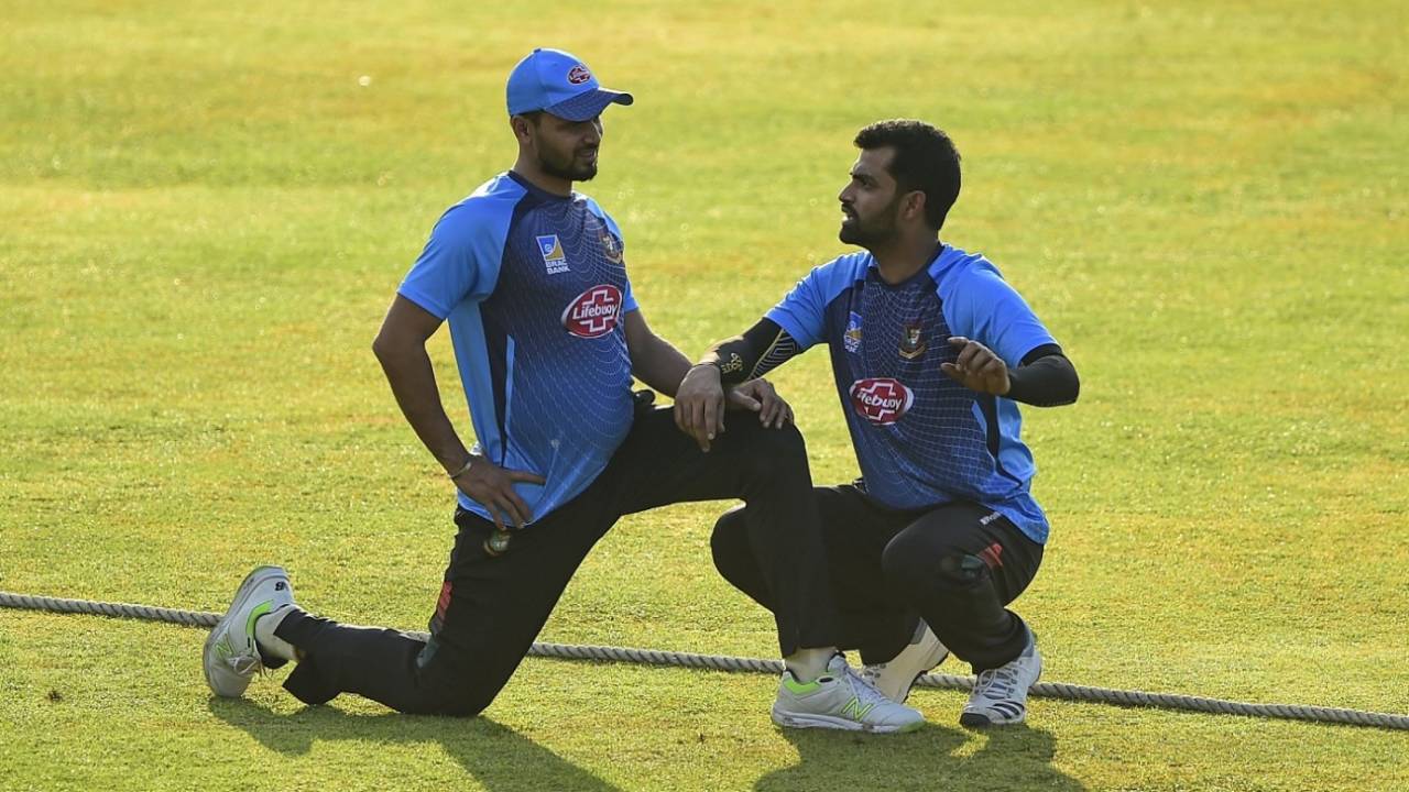 Mashrafe Mortaza and Tamim Iqbal exchange notes during a training session