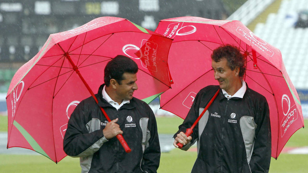 Aleem Dar (left) and Billy Bowden leave the pitch after an inspection, fourth Test, England v West Indies, Riverside, Durham, June 15, 2007