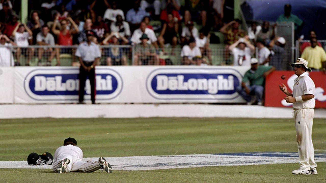 In and out - Ian Healy puts down Brian Lara during the climactic stages of the 1999 Barbados Test, West Indies v Australia, 3rd Test, Barbados, 5th day, March 30, 1999