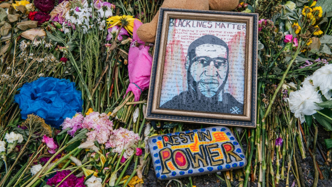 Flowers and messages are placed at the memorial for George Floyd, Minneapolis, June 9, 2020