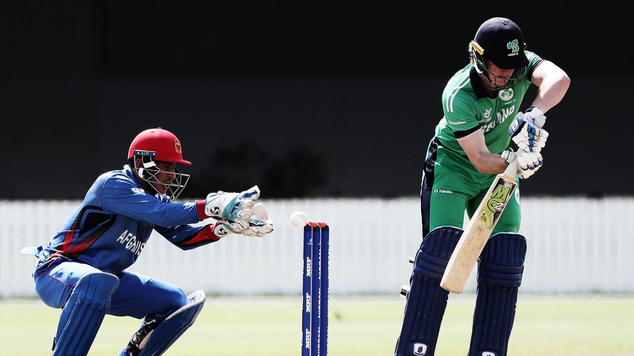Jamie Grassi looks to defend a ball while Rahmanullah Gurbaz waits behind the wicket, Ireland v Afghanistan, Under-19 World Cup, Group D, Whangarei, January 20, 2018