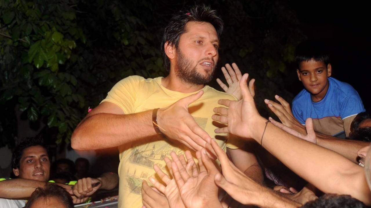 [File pic] Shahid Afridi is mobbed by his fans in Karachi&nbsp;&nbsp;&bull;&nbsp;&nbsp;AFP via Getty Images