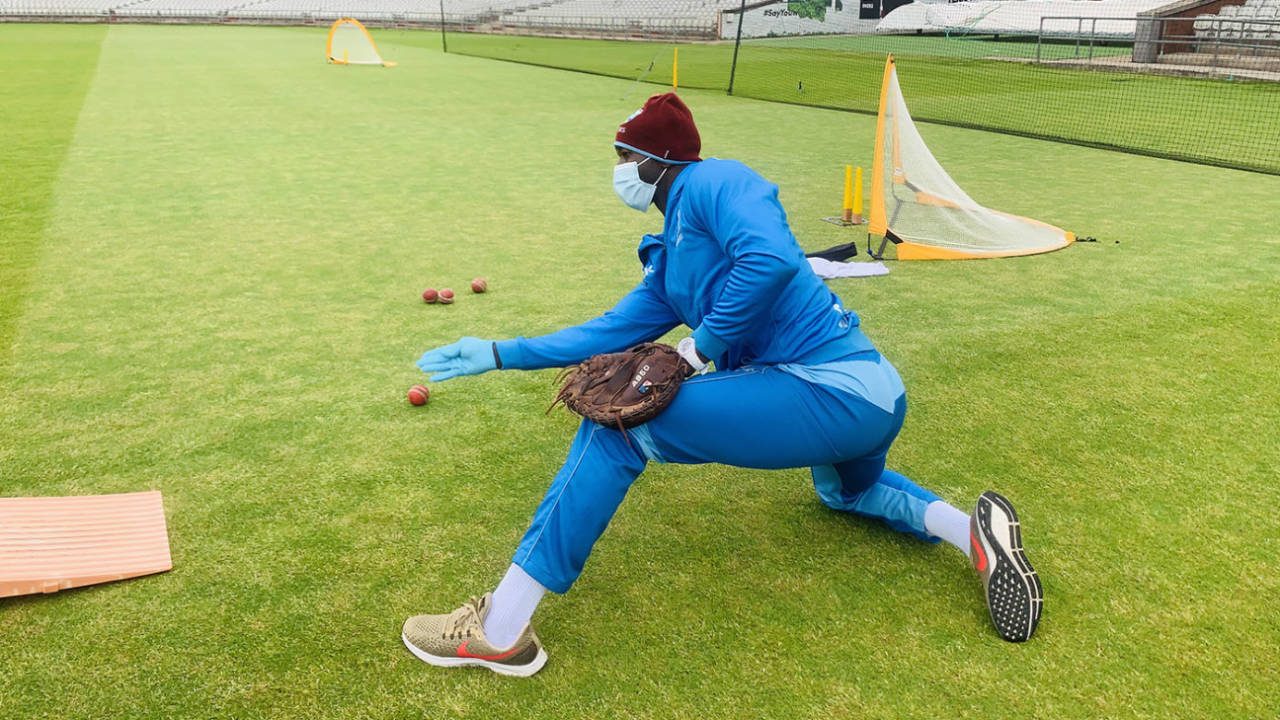West Indies fielding coach Rayon Griffith wears PPE while conducting a drill, Old Trafford, June 12, 2020