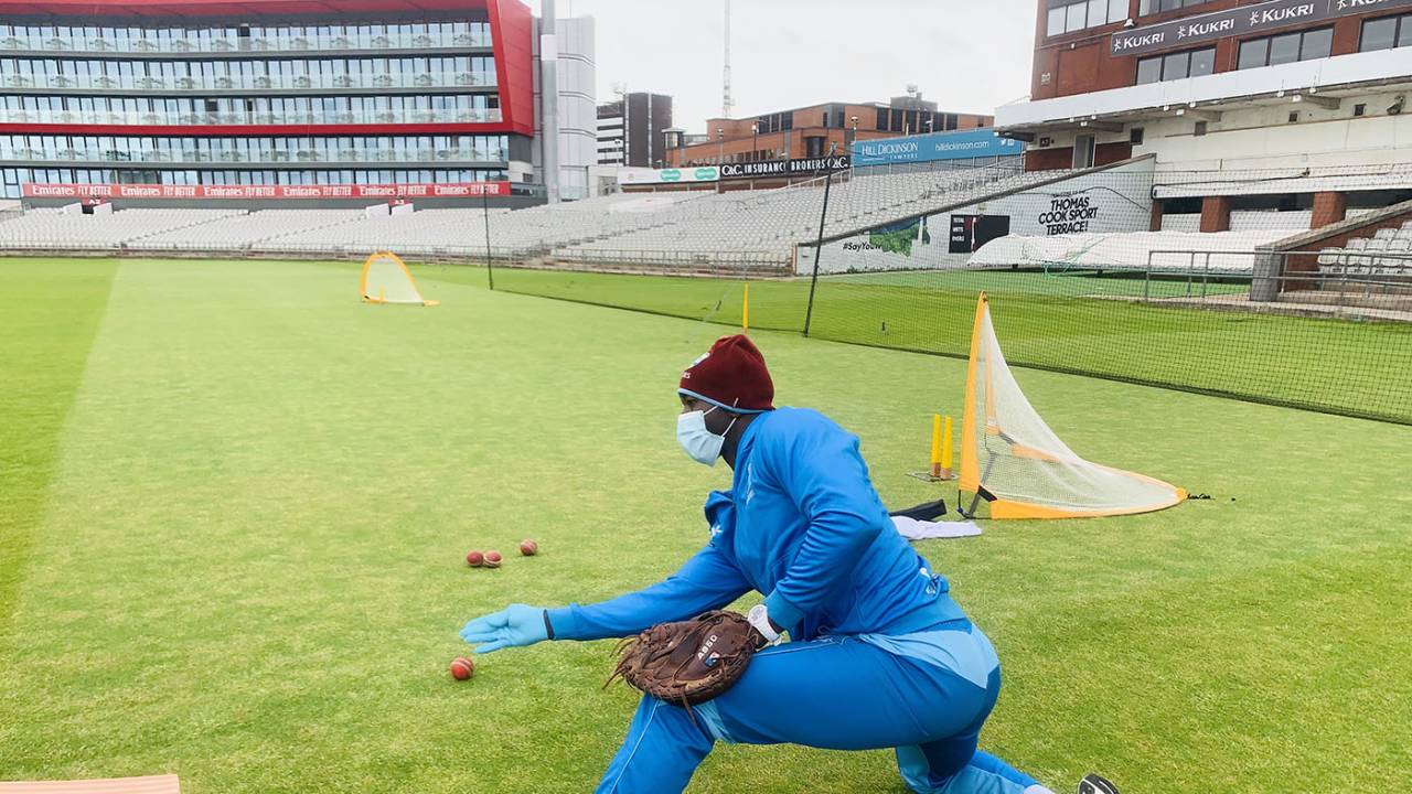 West Indies fielding coach Rayon Griffith wears PPE while conducting a drill, Old Trafford, June 12, 2020
