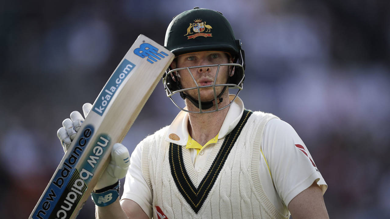 Steve Smith raises his bat as he leaves the ground after being dismissed for 82, England v Australia, 4th Test, Day 4, Manchester, September 7, 2019