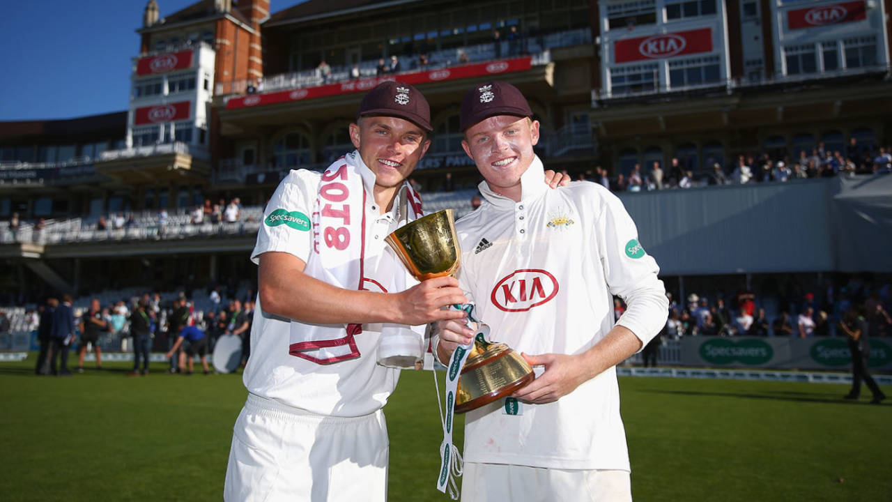Sam Curran and Ollie Pope celebrate the County Championship title win, Day Four, Surrey v Essex, at The Oval, in London, England, September 27, 2018