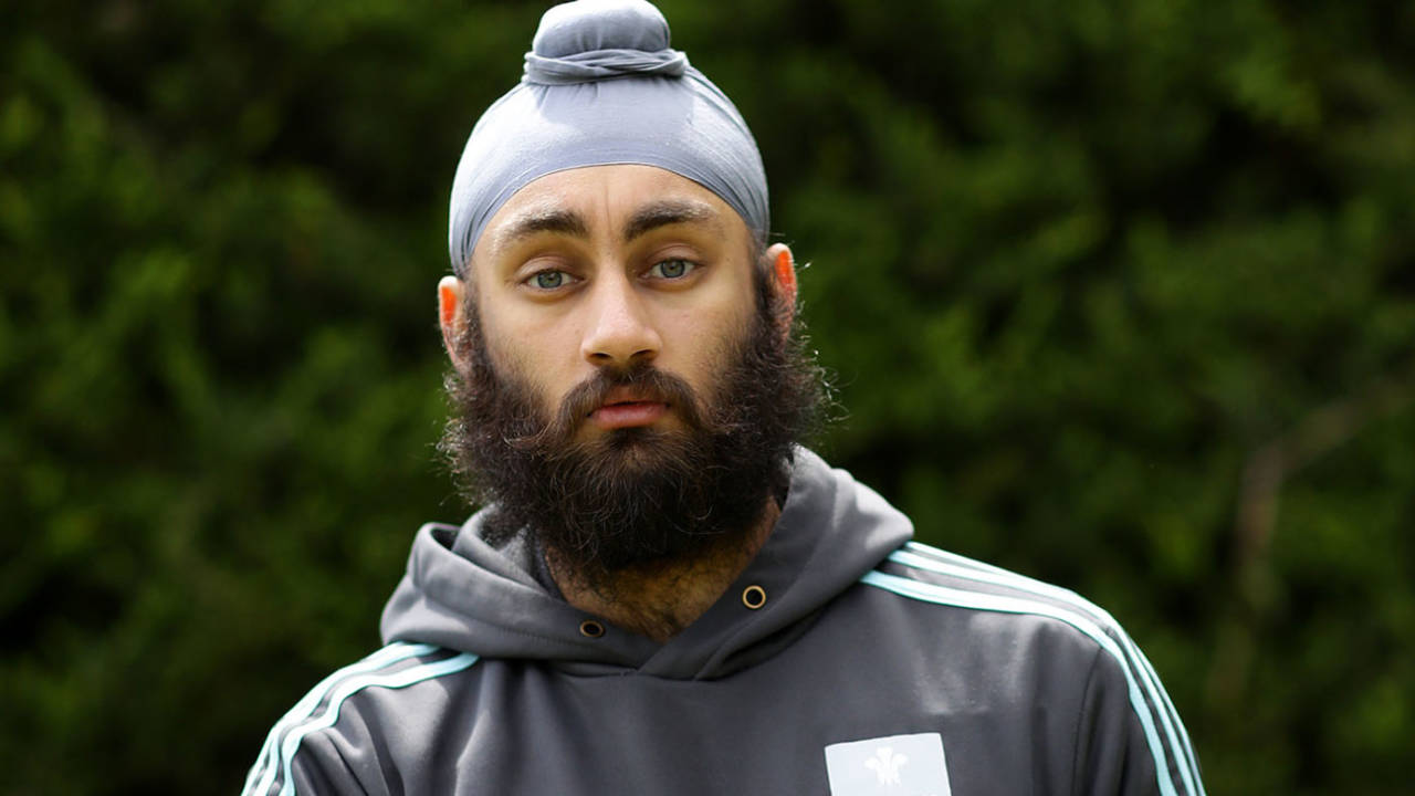 Amar Virdi, the Surrey and England Lions spinner, trains at his home