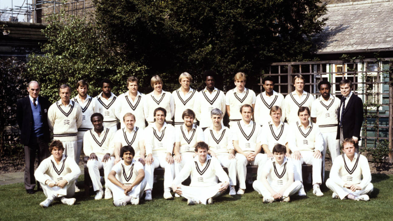 The Middlesex squad for the 1982 squad. Back row (left to right): Harry Sharp (scorer), Don Bennett, Colin Cook, Wilf Slack, Nick Kemp, Bill Merry, Andy Smith, Norman Cowans, Kevan James, Neil Williams, Paul Downton, Roland Butcher, John Miller. Middle row: Wayne Daniel, Graham Barlow, Mike Selvey, Mike Gatting, Mike Brearley (capt), Phil Edmonds, Clive Radley and John Emburey. Front row: George Ritchie, Rajesh Maru, Simon Hughes, Colin Metson, Keith Tomlins, April 20, 1982