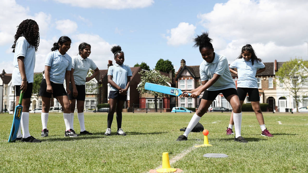 Girls participate in games of cricket during the launch of the South Asian Communities Action Plan in Leyton, London, May 10, 2018