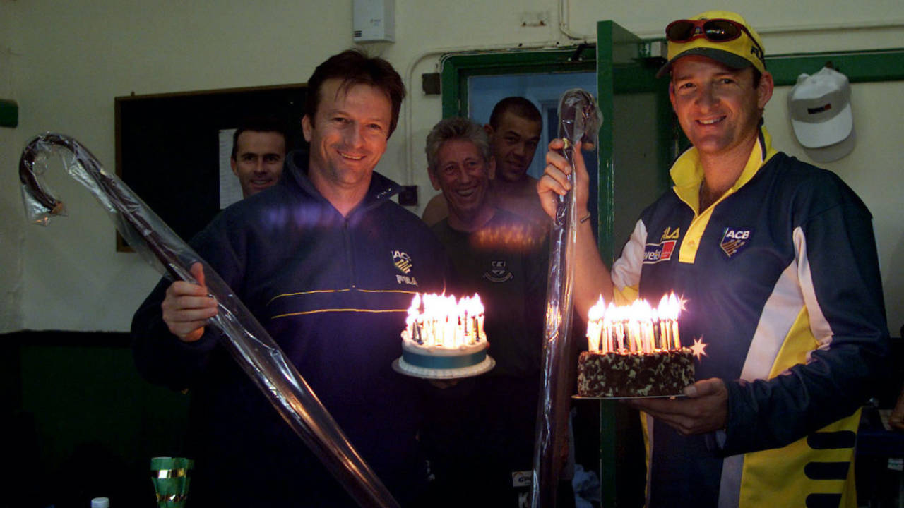 Steve and Mark Waugh with birthday cakes and walking sticks, day two, tour match, Worcestershire v Australians, New Road, Worcester, England, June 2, 2001