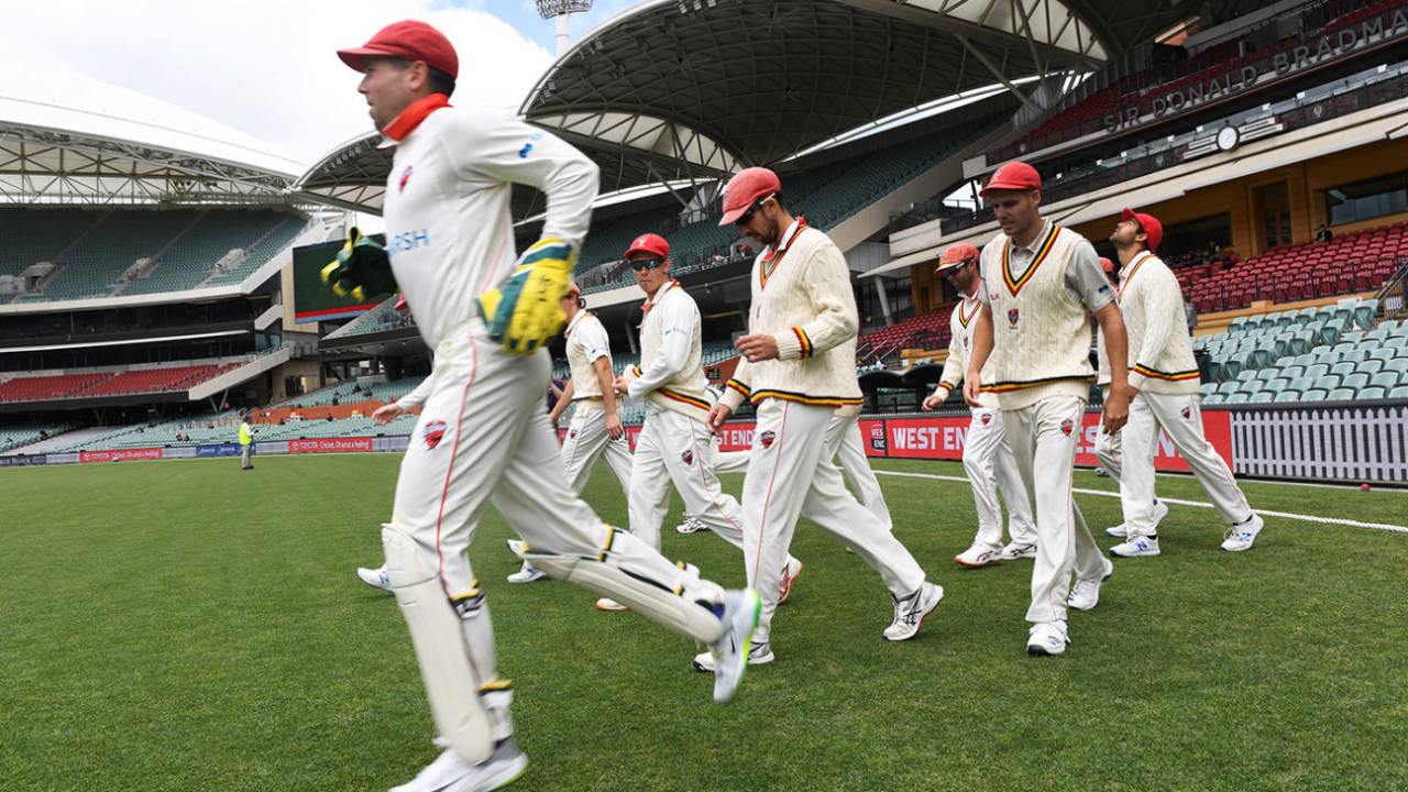 South Australia walk onto the field during the Sheffield Shield